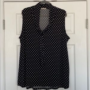 Black and whit polka dot knit blouse.